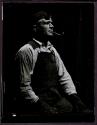 [Worker with goggles and a pipe, Empire State Building]
