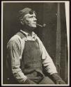 [Worker with goggles and a pipe, Empire State Building]