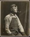 [Worker with goggles and a pipe, Empire State Building]