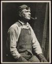 [Worker with goggles and a pipe, Empire State Building]