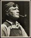 [Worker with goggles and a pipe, Empire State Building]