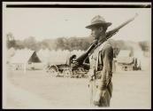 [Soldier with rifle, Army training camp]