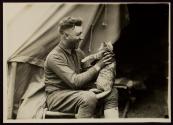 [Soldier with cat, Army training camp]