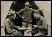 [Soldiers playing cards, Army training camp]