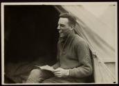 [Soldier laughing, Army training camp]