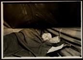 [Soldier in bed, Army training camp]