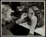Worker in clock factory