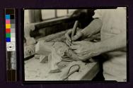 [About 40 years ago, at 19 years of age, he started out to learn wood- carving. Now he makes a master-model for parts of furniture. This goes to another man who, on a multiple-carver turns out 18 copies at a me.]