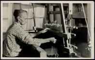 Another view of Aunt Lizzie Reagan weaving old fashioned jean at the Pi Beta Phi School, Gatlinburg, Tennessee. This aged mountain woman lives near the School and earns her living weaving.