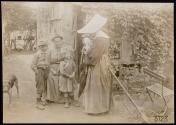 [Nun talking with woman & children, ARC War Relief]