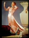 [Woman in striped gown]