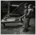 [Mayan cotton spinner]