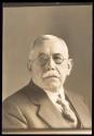 [Man wearing glasses]