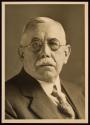 [Man wearing glasses]