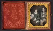 [Man and woman with deceased child.]