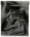 [Cut paper abstraction]