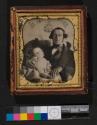 [Father posed with deceased young daughter]