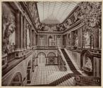 [Large interior hall with staircase and statues]