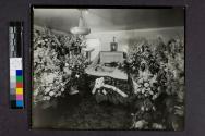 [Mrs. Thompson in her coffin]