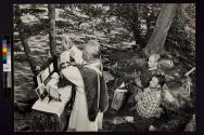 [Father Daniel Linehan saying mass in the Maine woods]