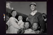 [Ex-guerrilla Nim Churl-Jin is welcomed home by his wife and family and the baby he had never seen.]
