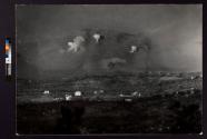 [At sunrise smoke shells were fired to provide a smoke screen for the infantry.]