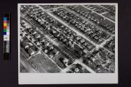 [Aerial view of suburban neighborhood]
