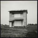 [Boarded up structure, location unknown]