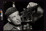 [Seismologist and Geologist: Rev. Daniel Linehan, S.J. at work on the Kennebec River, Maine.]