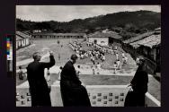 [Fathers John T. Newell, John C. Murphy, and Charles I. Prendergast watching the children of Minas-Deroro, British Honduras, rehearsing for their fiesta in the square of this ancient village.]