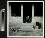Man Shaving on Verandah