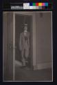 [Alvin Langdon Coburn in doorway (wearing a straw hat)]