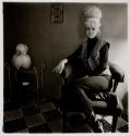 Lady Bartender at Home with a Souvenir Dog, New Orleans, LA