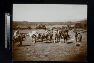 [Caravan of people and donkeys]