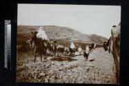 [Caravan of people on donkeys]