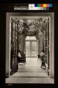 View through doorway of Conservatory looking into the Terrace Garden in George Eastman's time