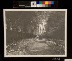 Woman & Child walking in George Eastman's flower garden