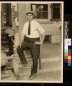 Workman poses by Porte Cochere during Conservatory Expansion