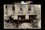 View of George Eastman's Home raised up for Conservatory Expansion - view of back porch of George Eastman's Home