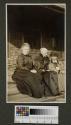 Adelaide Hubbell, Maria Eastman and Mary Mulligan on porch, Oak Lodge trip