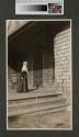Maria Eastman on porch, Oak Lodge trip