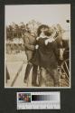 Walter Hubbell and George Eastman with child, Oak Lodge trip
