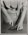 [Student inking printing block]