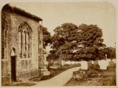 [Graveyard next to church]