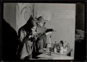 [Students as alchemists with chemicals]