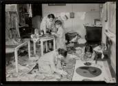 [Students & teacher in art class]