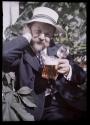 [Frank Eugene with stein of beer]