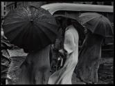 Figures in the rain