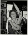 [Child with cob of corn]