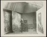 [George S. Cook in his photography studio]